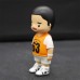Little boy in orange clothes Blind box action figure