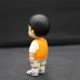 Little boy in orange clothes Blind box action figure